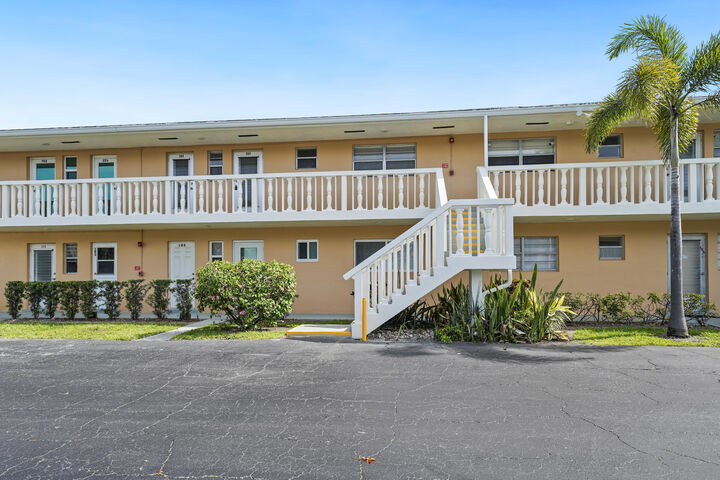 Property Photo:  2222 NE 1st Way 204  FL 33435 