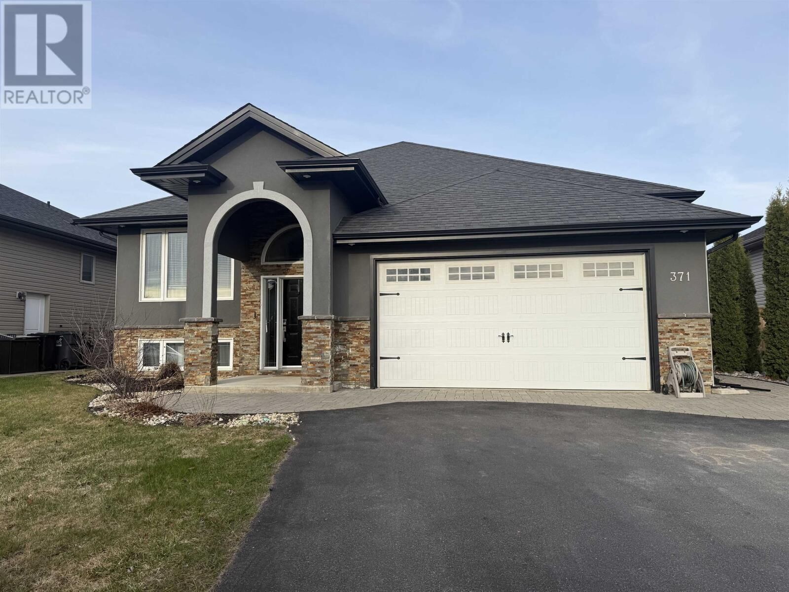 Property Photo:  371 Cougar Cres  ON P7C 0B3 