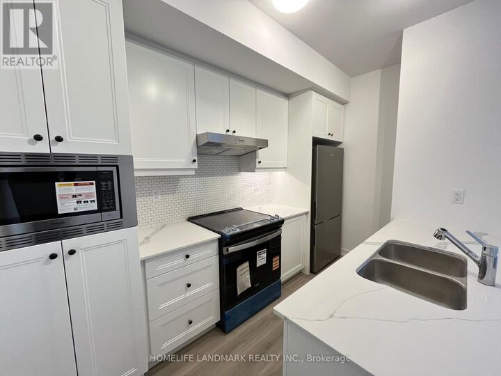 Property Photo:  3 Bancroft Lane 219  ON L4E 1M1 