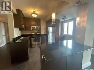 Property Photo:  1804 320 5th Avenue N  SK S7K 2P5 