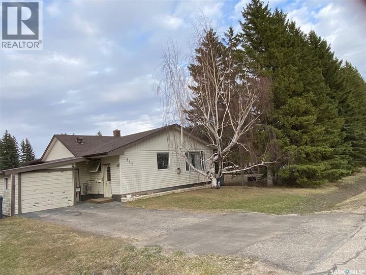 Property Photo:  515 + 511 Springs Avenue  SK S0A 3V0 