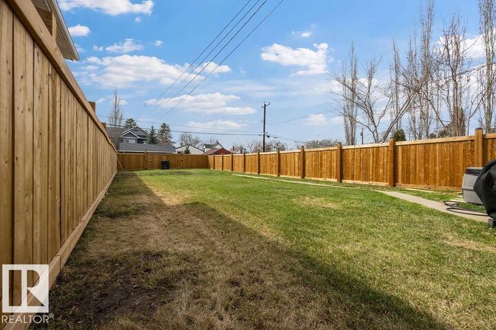 Property Photo:  12210 95A Street NW  AB T5G 1S1 