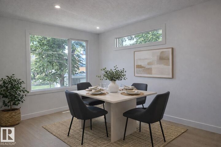 Property Photo:  10617/19/21 83 Street NW  AB T6A 3P6 