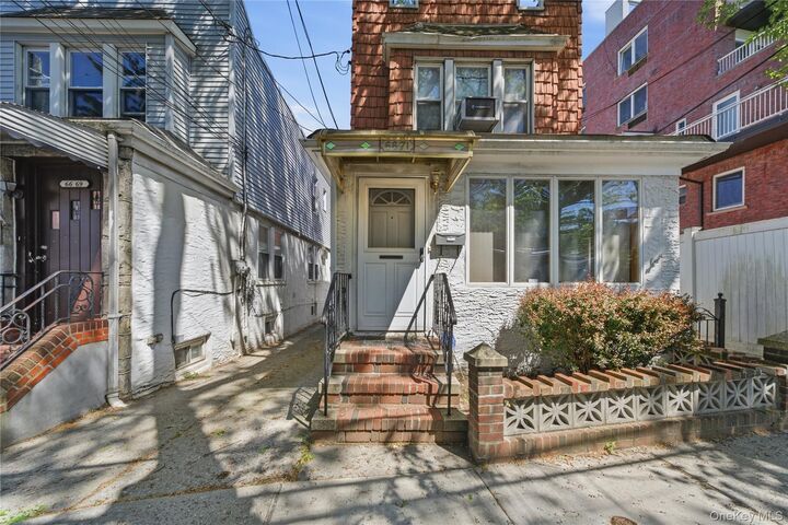 Property Photo:  66-71 70th Street  NY 11379 