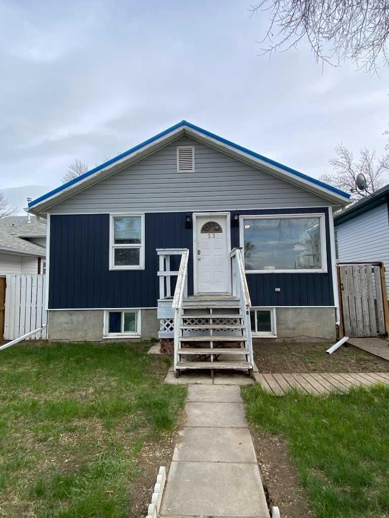 Property Photo:  23 Pine Avenue W  AB T1A 0A1 