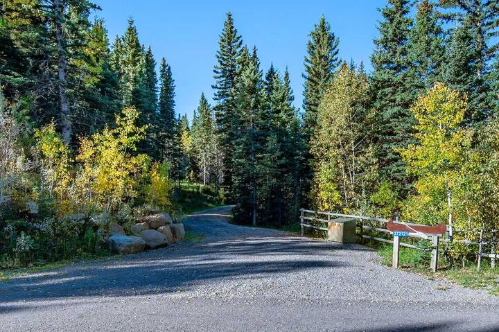 Property Photo:  272121 Coalmine Road W  AB T0L 1W4 