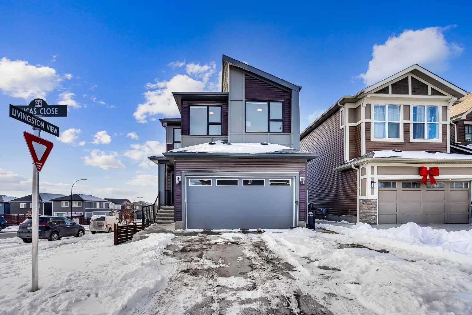 Property Photo:  210 Lucas Close NW  AB T3P 1Z4 