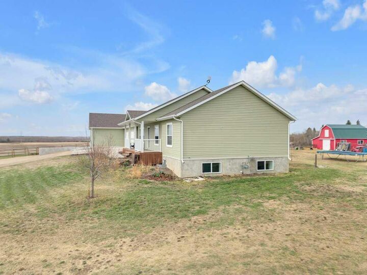 Property Photo:  1 -251061 Township Road 431A  AB T4J 1R1 
