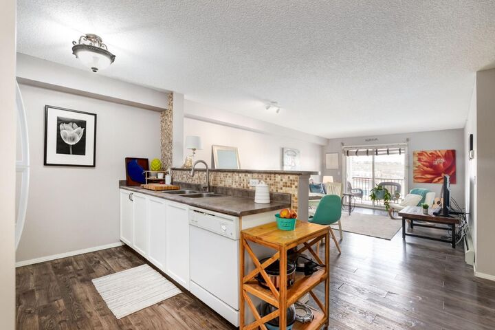 Property Photo:  12 Cimarron Common 1414  AB T1S 2G1 