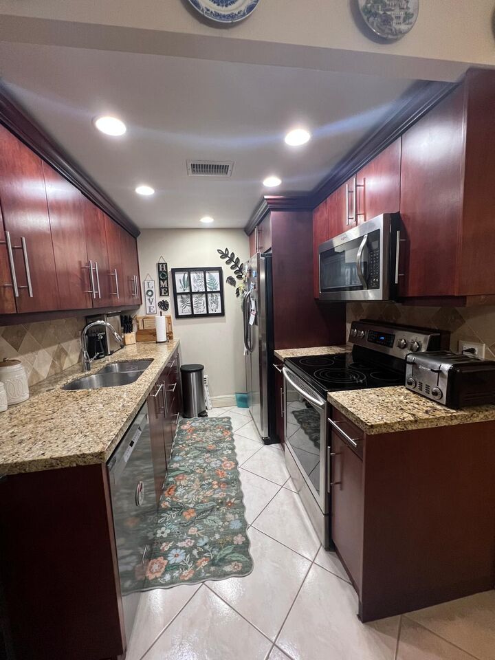 Property Photo:  4056 Guildford D  FL 33434 