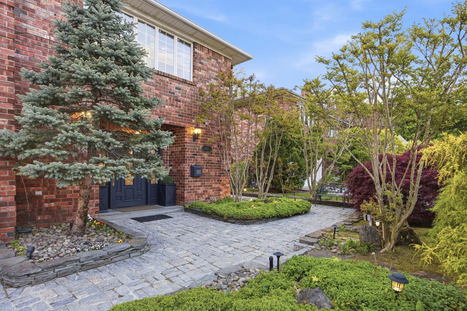 Property Photo: 234-11 38th Drive NY 11363