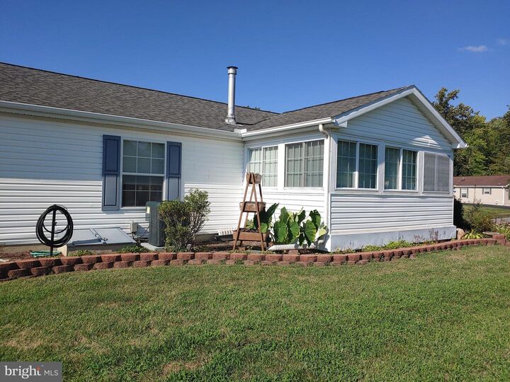 Property Photo:  309 Persimmon Circle W 309  DE 19901 