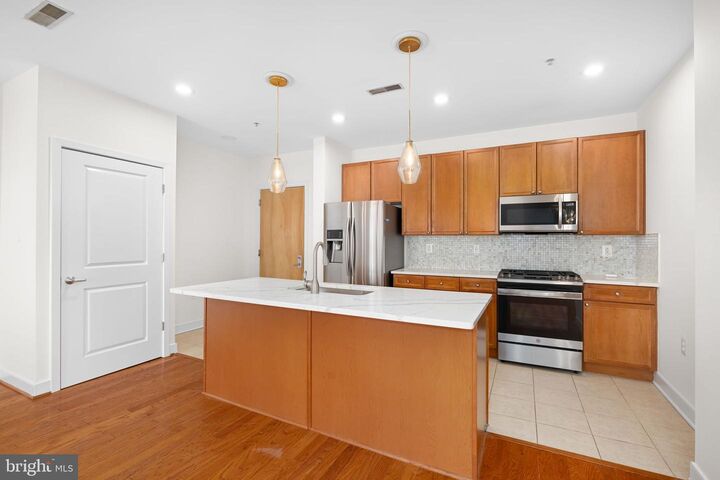 Property Photo:  181 Reed Avenue E 110  VA 22305 