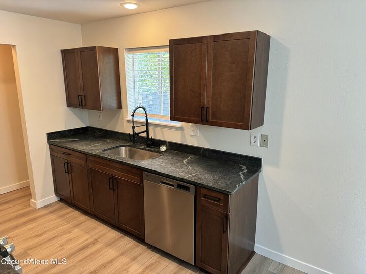Property Photo:  1715 Main St A&Ampb  ID 83864 
