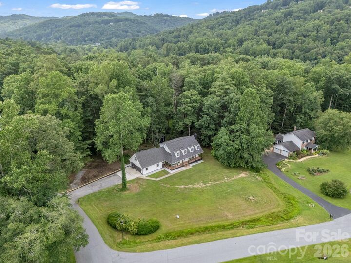 Property Photo:  213 Raintree Drive  NC 28791 