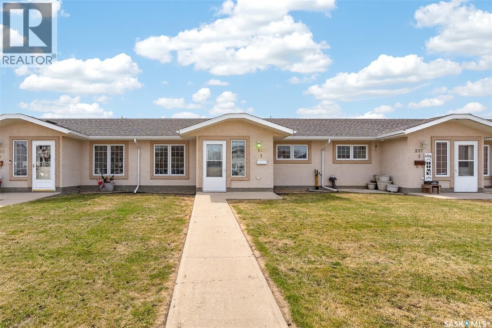 Property Photo:  2 257 Fairford Street W  SK S6H 1V5 