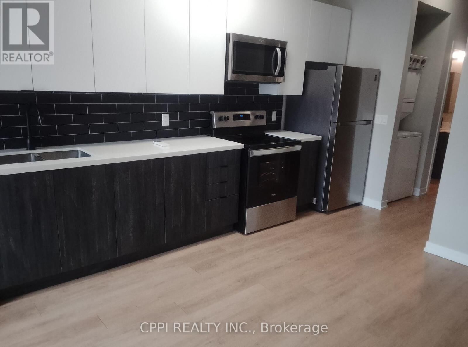 Property Photo:  140 Simcoe Street 310  ON K9H 0K5 
