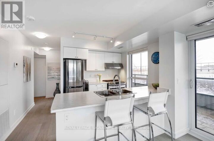 Property Photo:  8 Trent Avenue 323  ON M4C 0A6 
