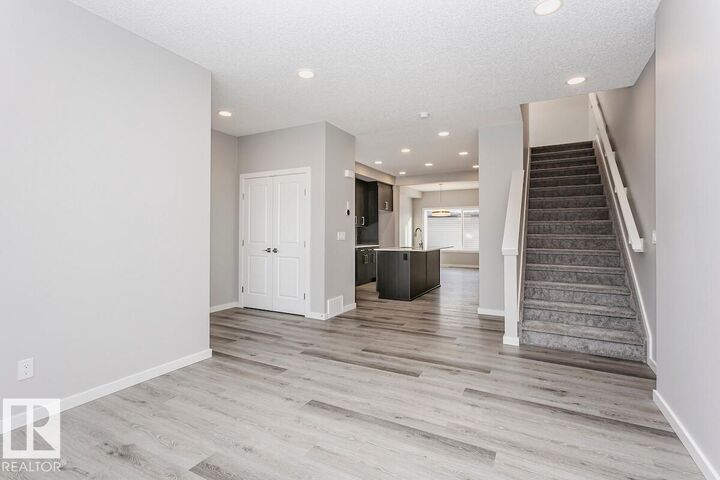 Property Photo:  314 Hawthorn Way  AB T4X 0L1 
