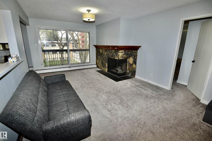 Property Photo: 10160 119 Street NW 21 AB T5K 1Y9