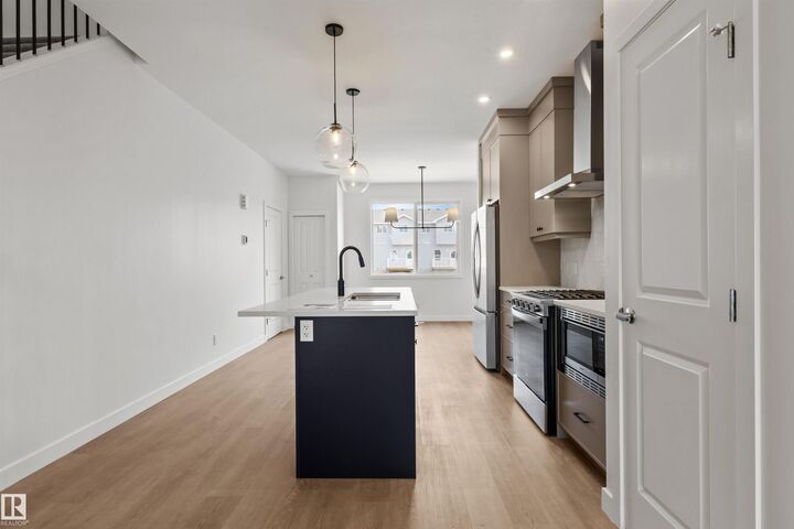 Property Photo:  1217 Cristall Way SW  AB T6W 5S5 