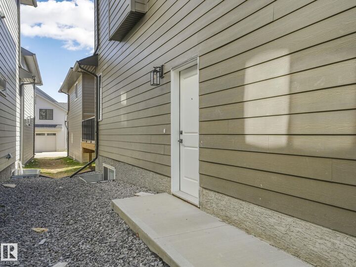 Property Photo:  6125 Crawford Drive SW  AB T6W 4L8 