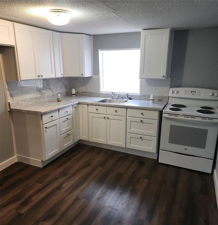 Property Photo: 211 Avenue B 1/2 TX 77568