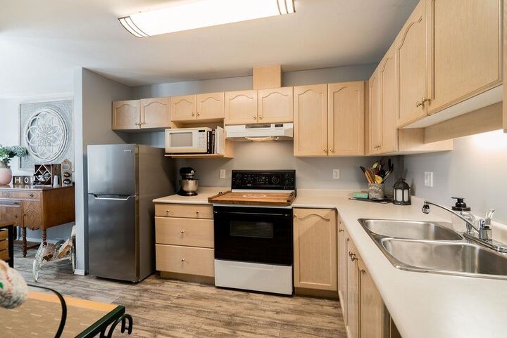 Property Photo:  19130 Ford Road 203  BC V3Y 2P1 