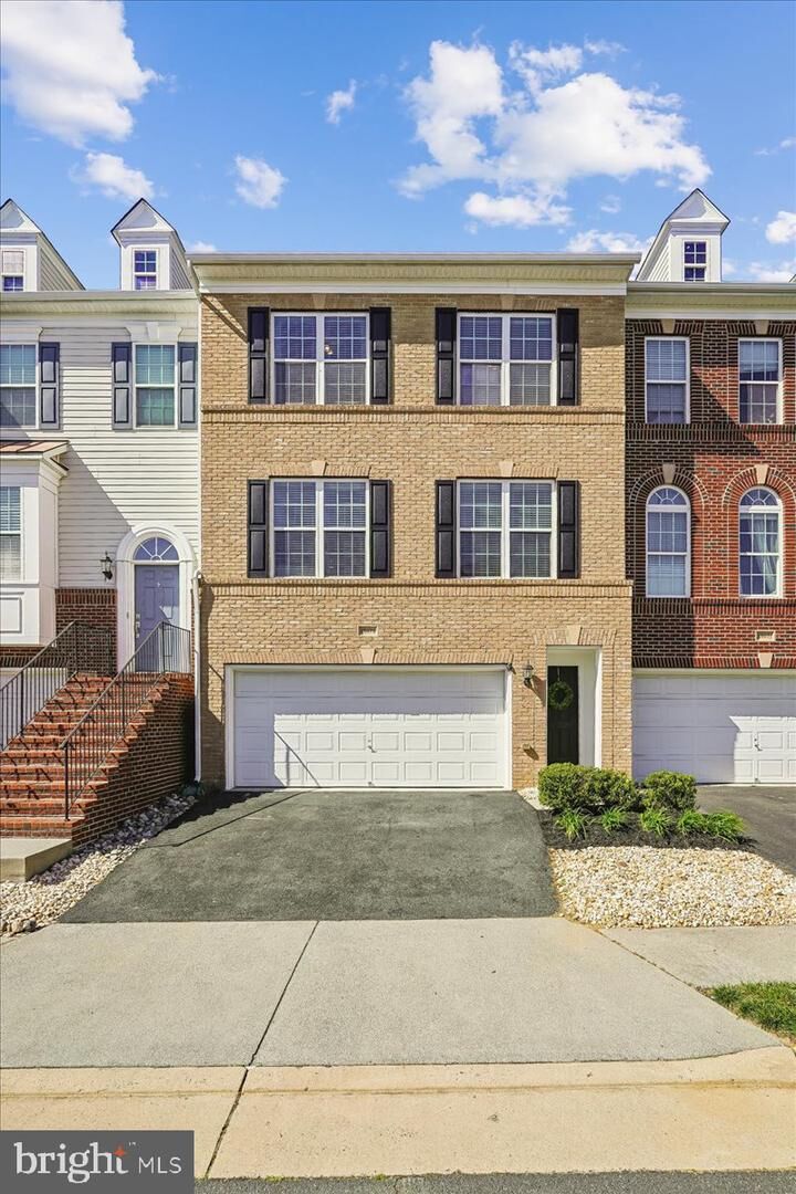 Property Photo:  25073 Prairie Fire Square  VA 20105 