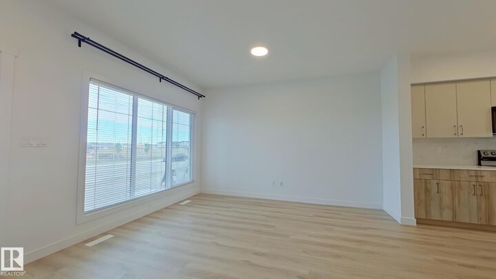 Property Photo:  1037 Aster Boulevard NW Main  AB T6T 1J1 