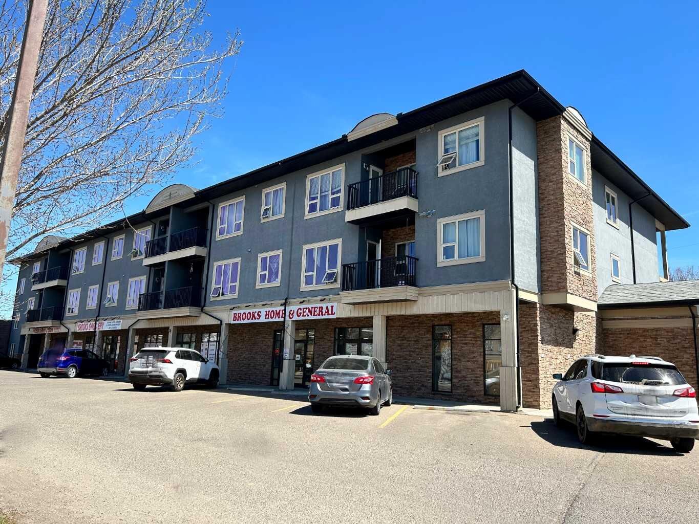 Property Photo:  330 2 Street W 24  AB T1R 0E9 