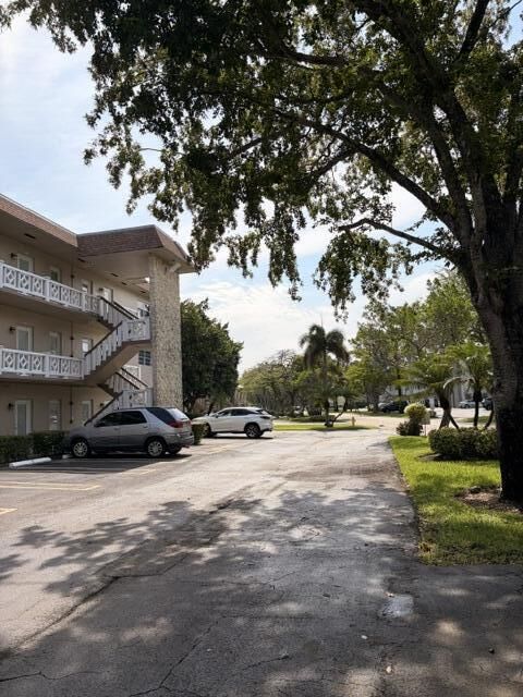 Property Photo:  5103 NW 35th Street 401  FL 33319 