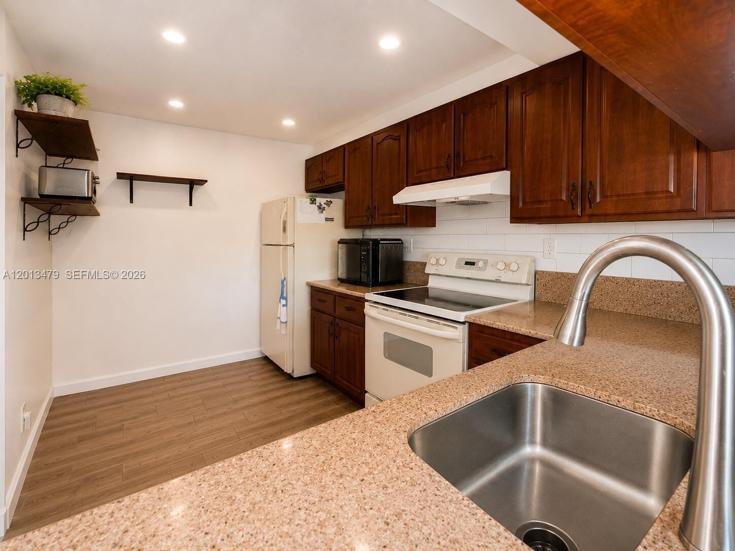 Property Photo:  3199 Foxcroft Rd 215  FL 33025 