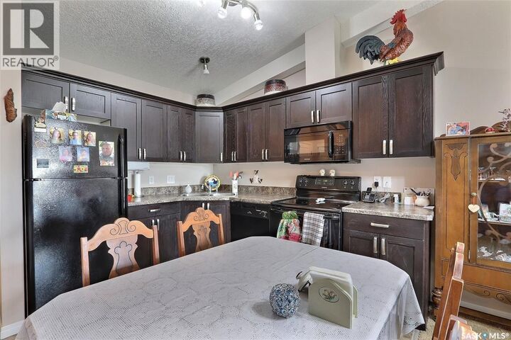 Property Photo:  401 1501 15th Street E  SK S6V 4C4 