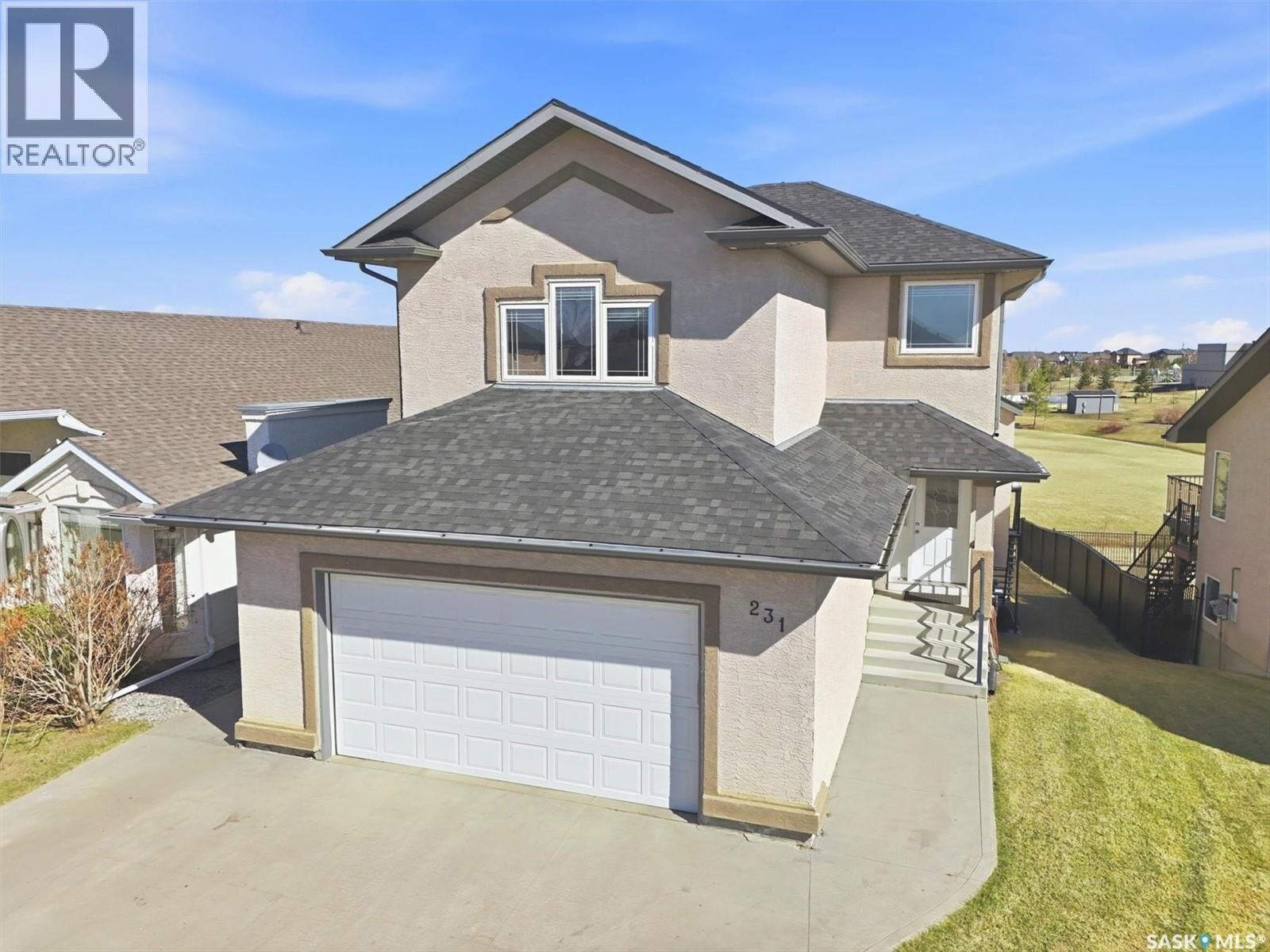Property Photo:  231 Willowgrove Boulevard  SK S7W 1A1 