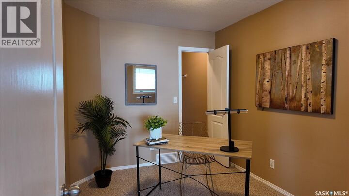 Property Photo:  E 4128 Buckingham Drive E  SK S4V 3A9 