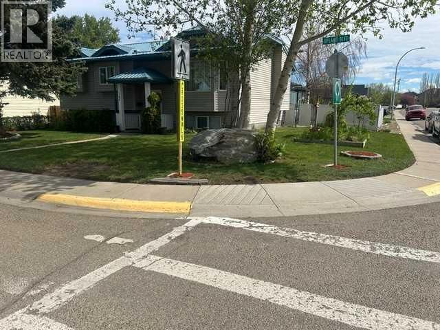 Property Photo:  144 Upland Boulevard West  AB T1R 0R3 