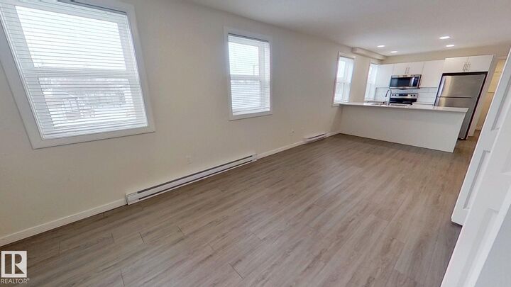 Property Photo:  4816 52 Street 7  AB T9A 3N2 
