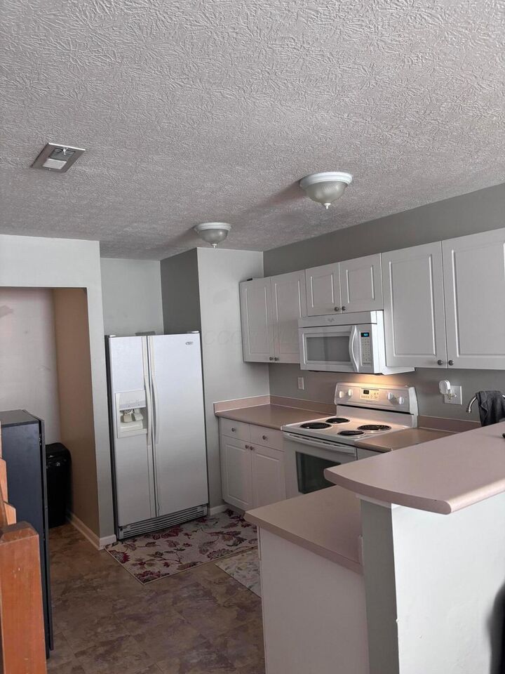 Property Photo:  5893 Andrew John Drive  OH 43054 