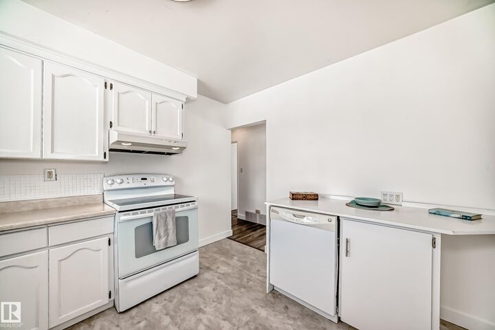 Property Photo:  12824 134 Avenue NW  AB T5L 3V5 