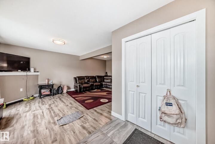 Property Photo:  12833 123 Street NW 1  AB T5L 0J4 