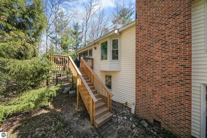 Property Photo:  3317 N Timberwood Drive  MI 49686 