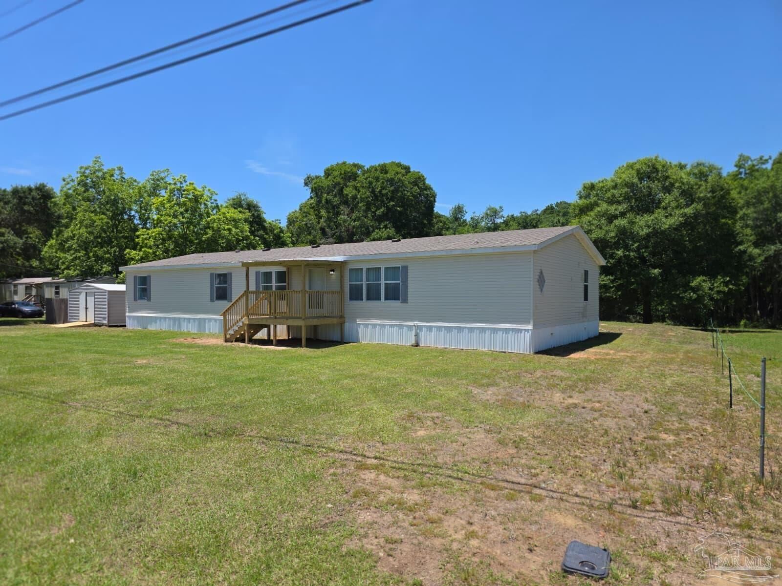 Property Photo: 5135 Bent Tree Rd FL 32583