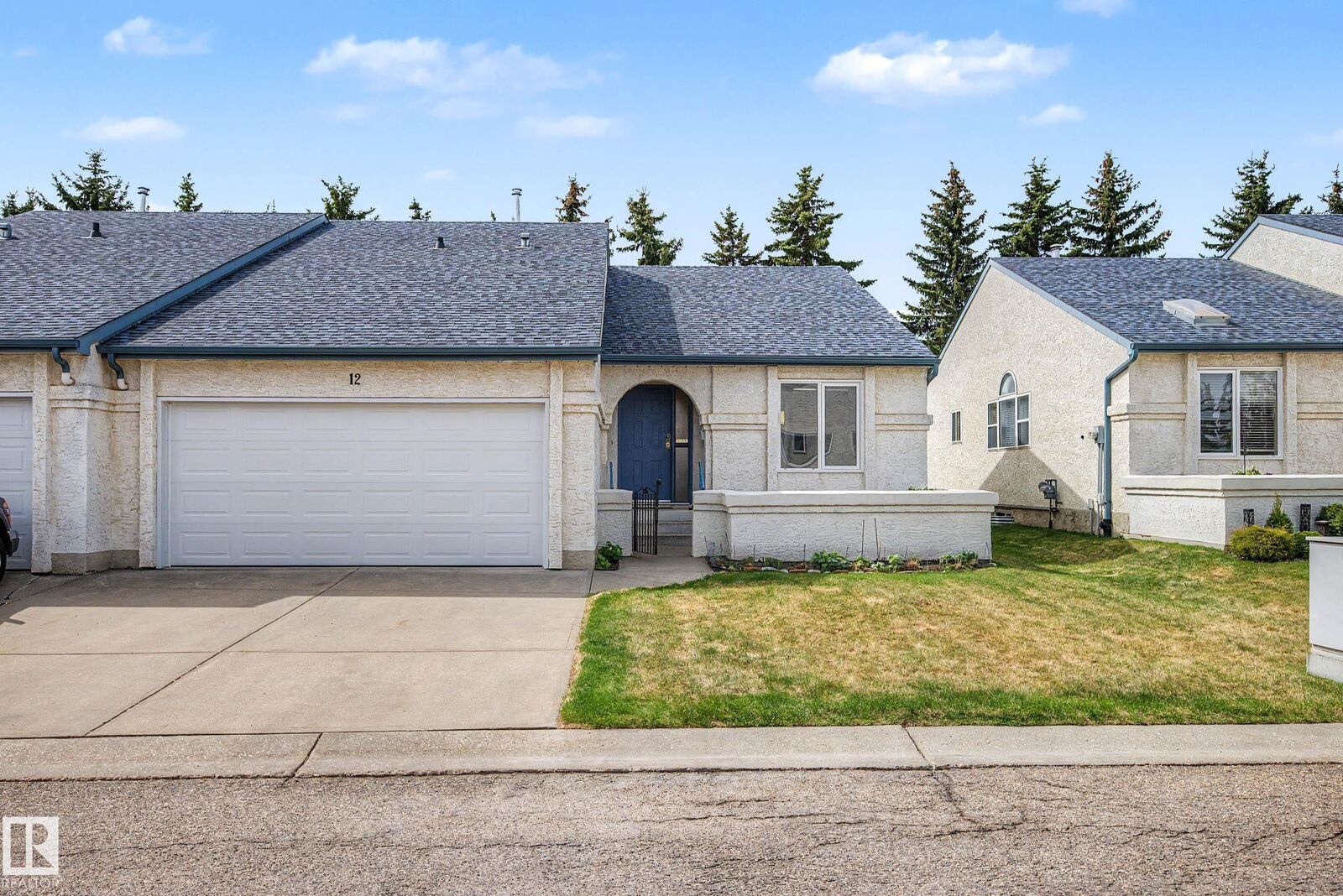 Property Photo: 9718 176 Street NW 12 AB T6L 1W3