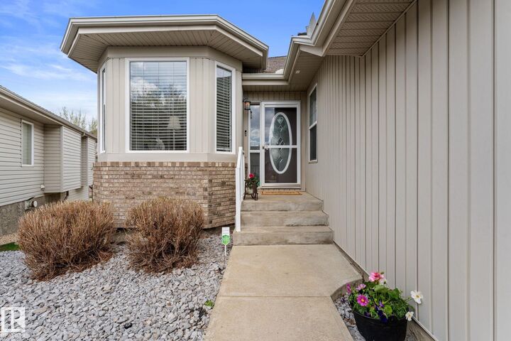 Property Photo:  10848 8 Avenue SW 6  AB T6W 1G5 