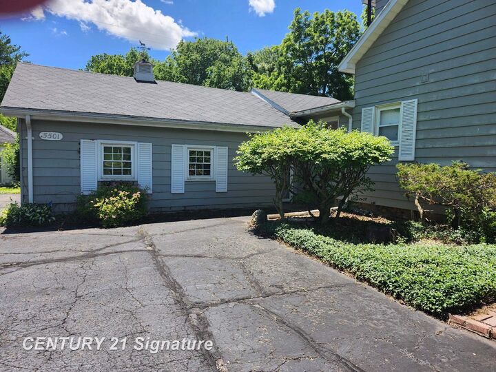 Property Photo:  5501 Calkins Road  MI 48532 