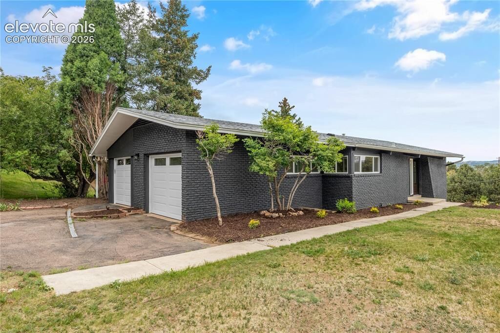 Property Photo:  202 Stratmoor Drive  CO 80906 