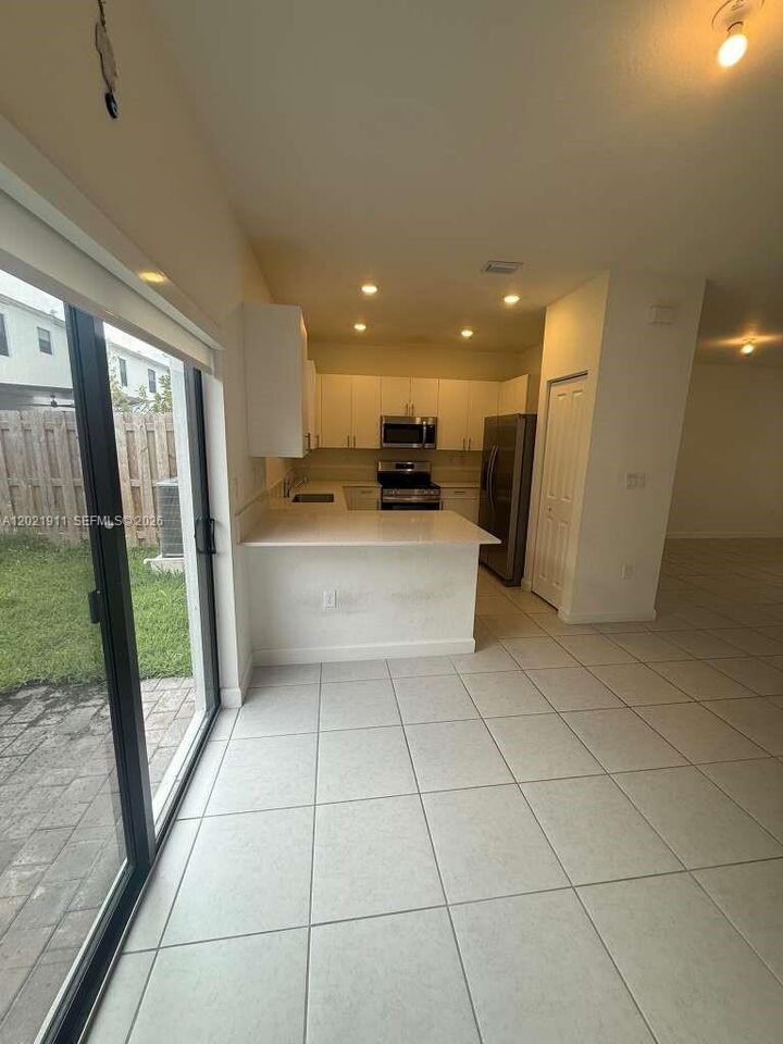 Property Photo:  12942 SW 231st St 12942  FL 33170 