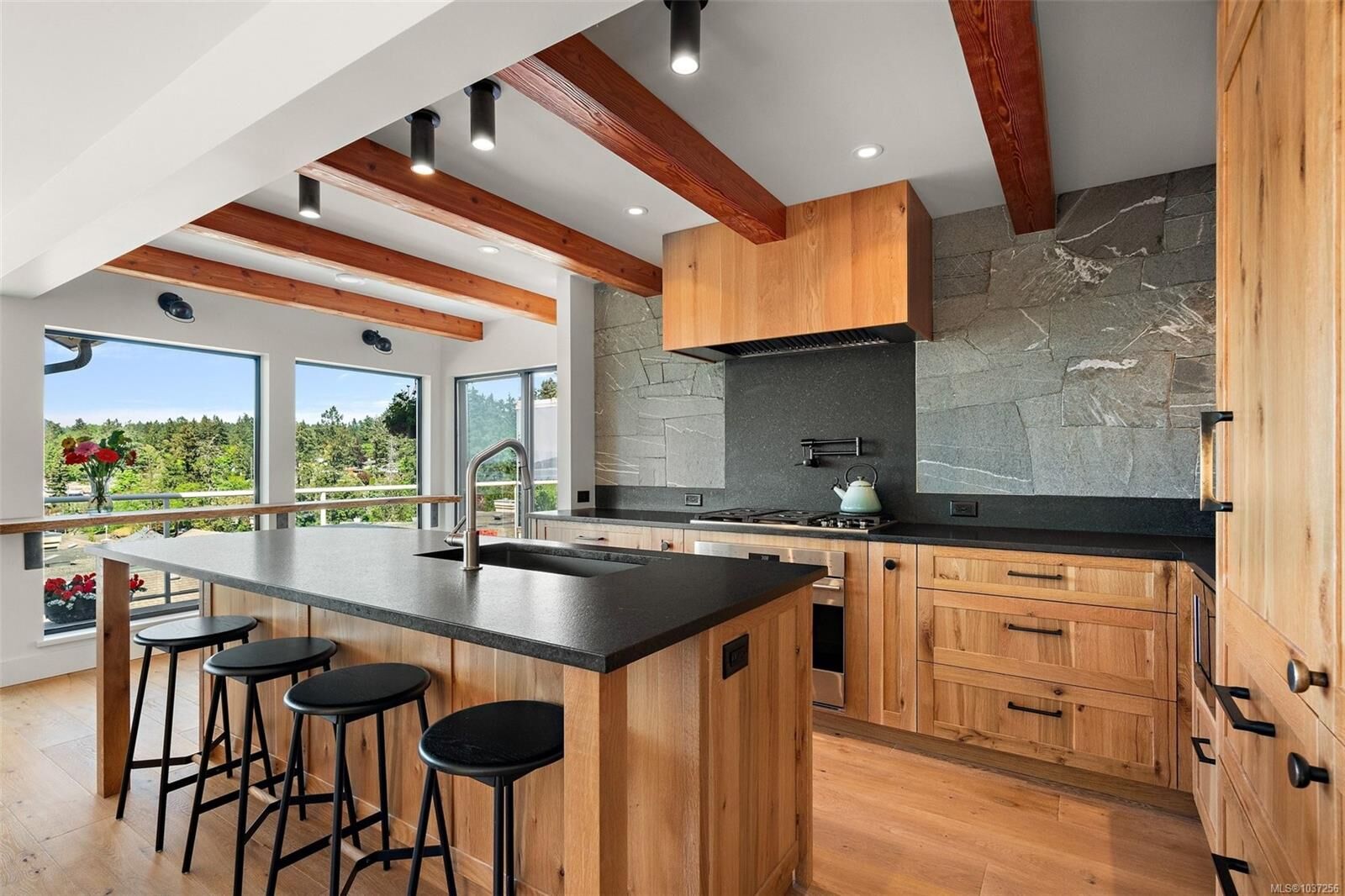 Property Photo: 6880 Wallace Dr 702 BC V8M 1N8