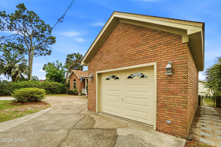Property Photo:  6303 Palm Court  FL 32408 